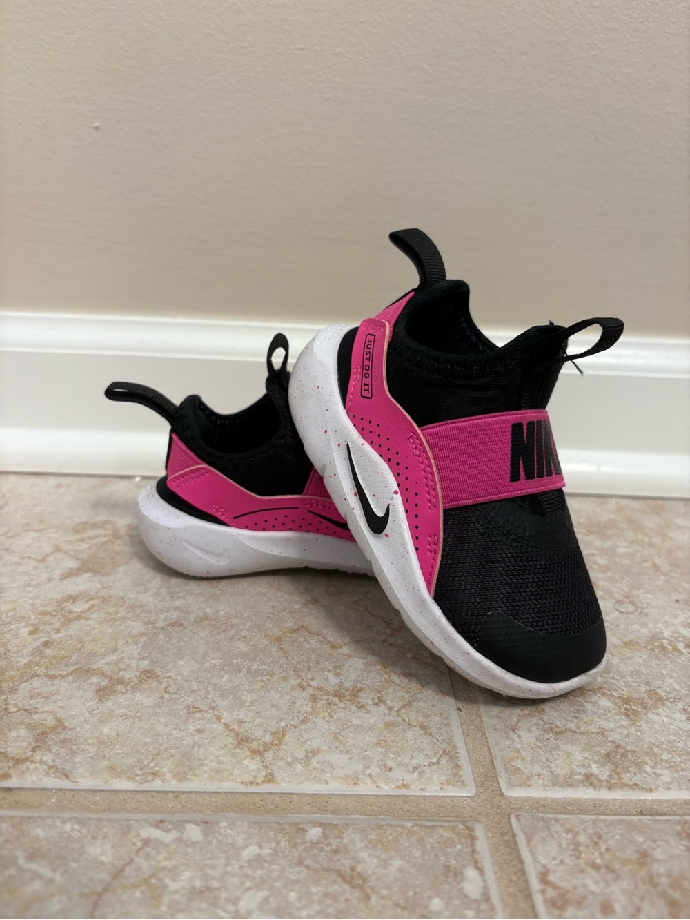 Nike Kids Black and Pink Slip-On Sneakers